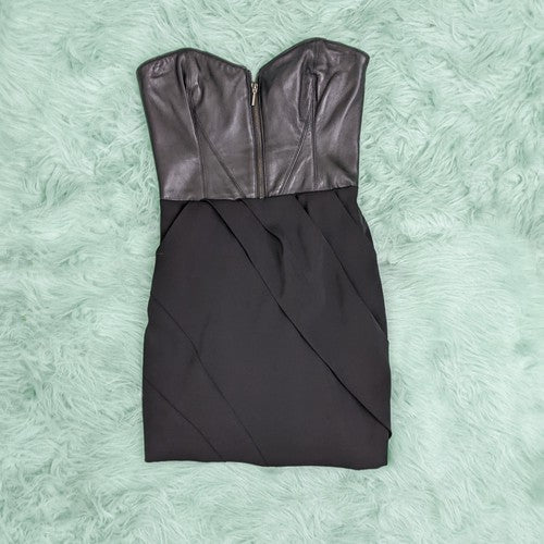 Bebe shoulderless dress in black - size 2